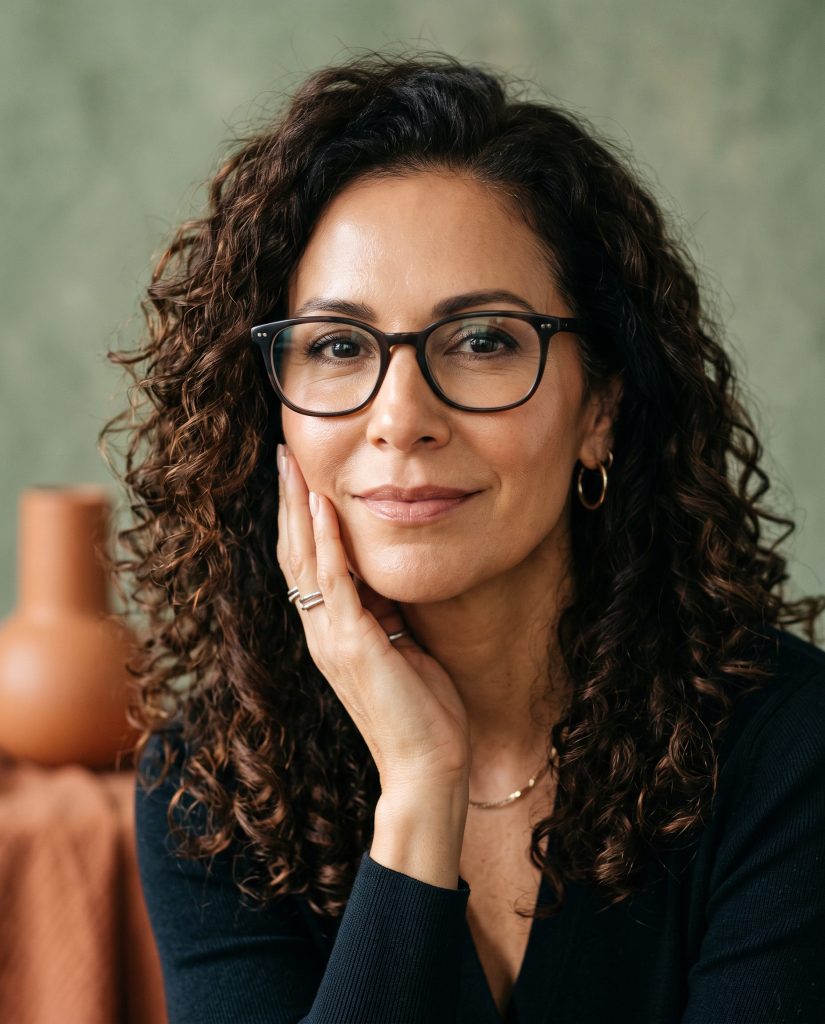 close up of beautiful woman looking at the camera with clear refreshed skin